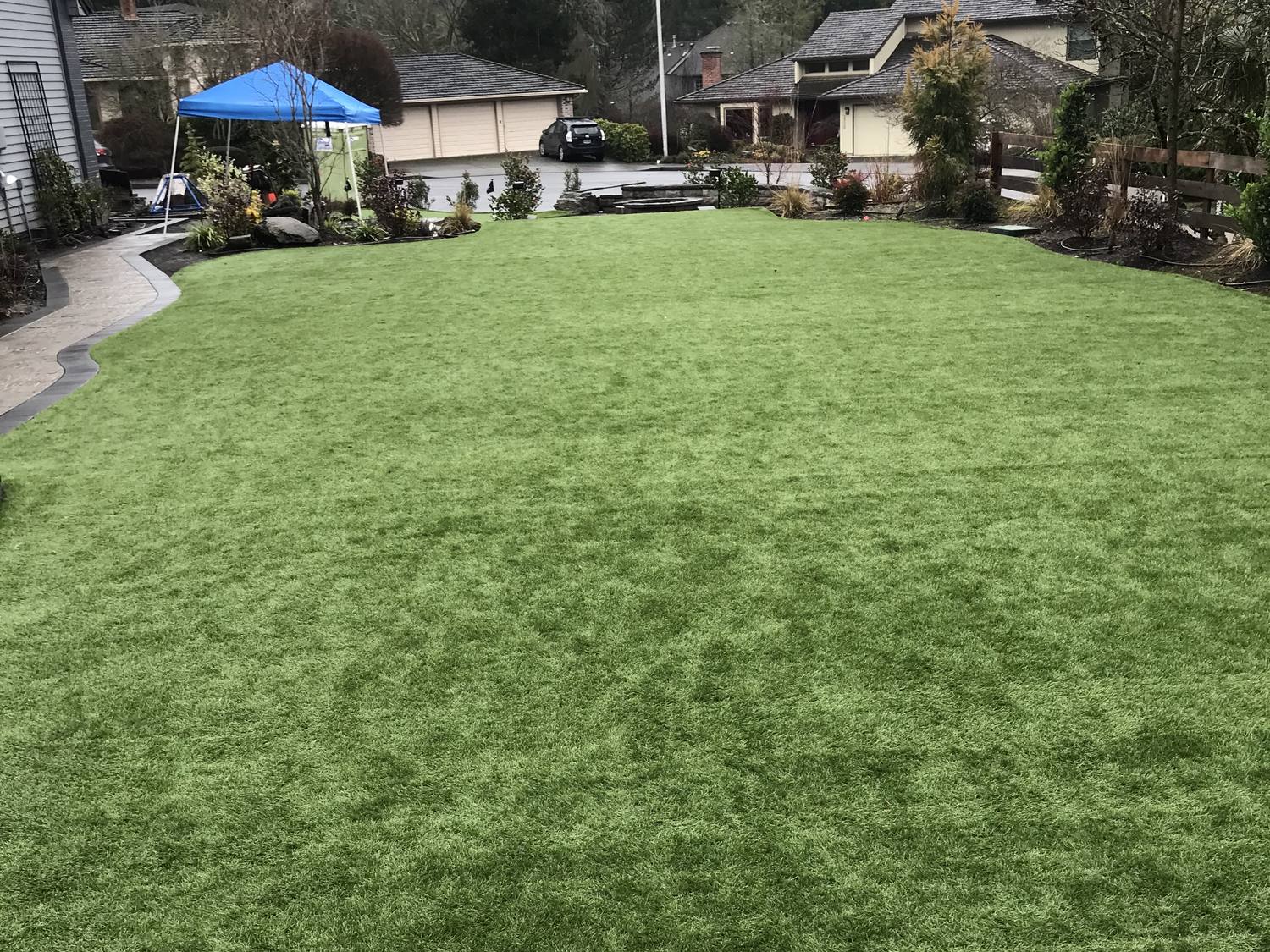 Large backyard synthetic grass lawn by Oregon Artificial Turf in Portland
