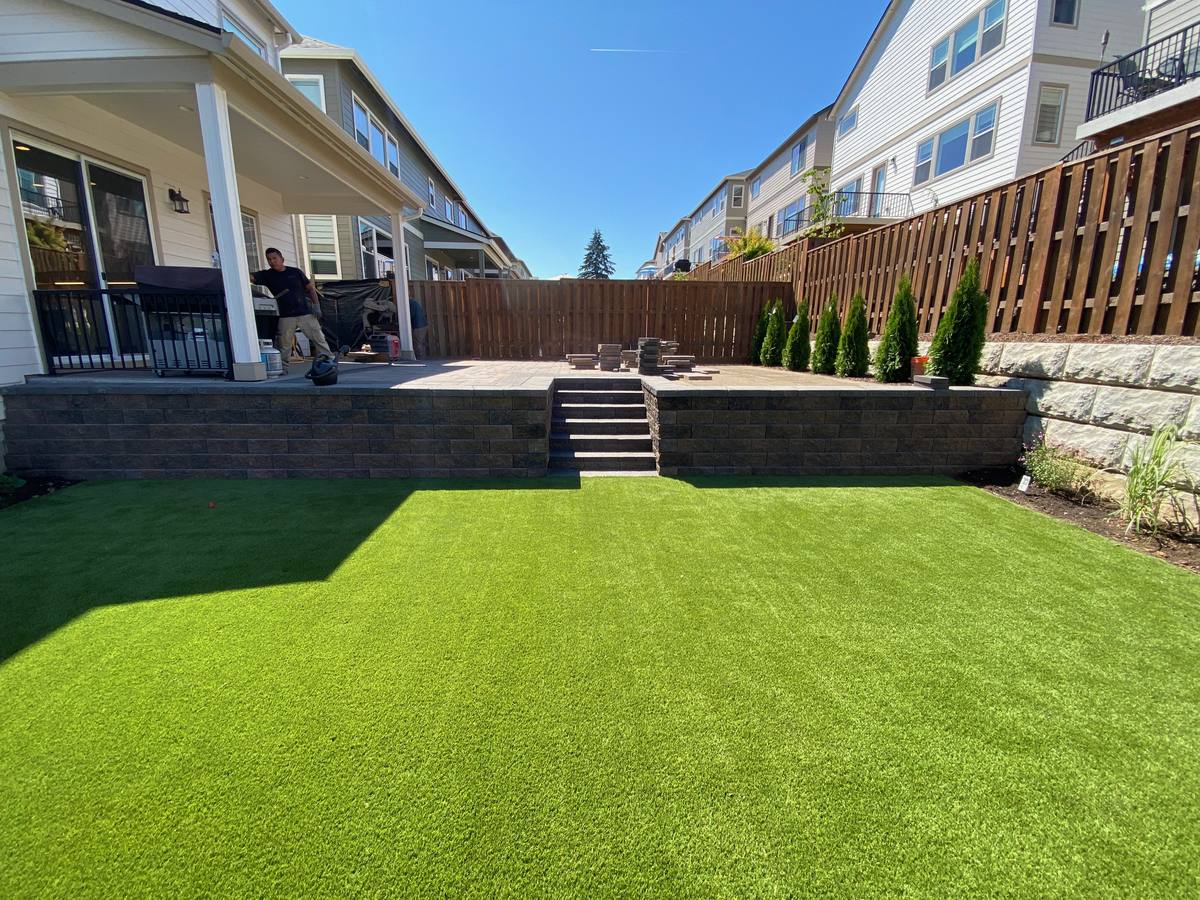 Artificial turf on a graded, terraced yard in the Portland area